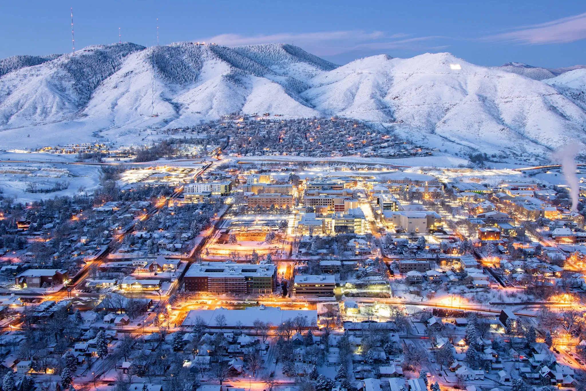 A winter dusk panorama of Golden aglow below snow-covered Lookout Mountain.